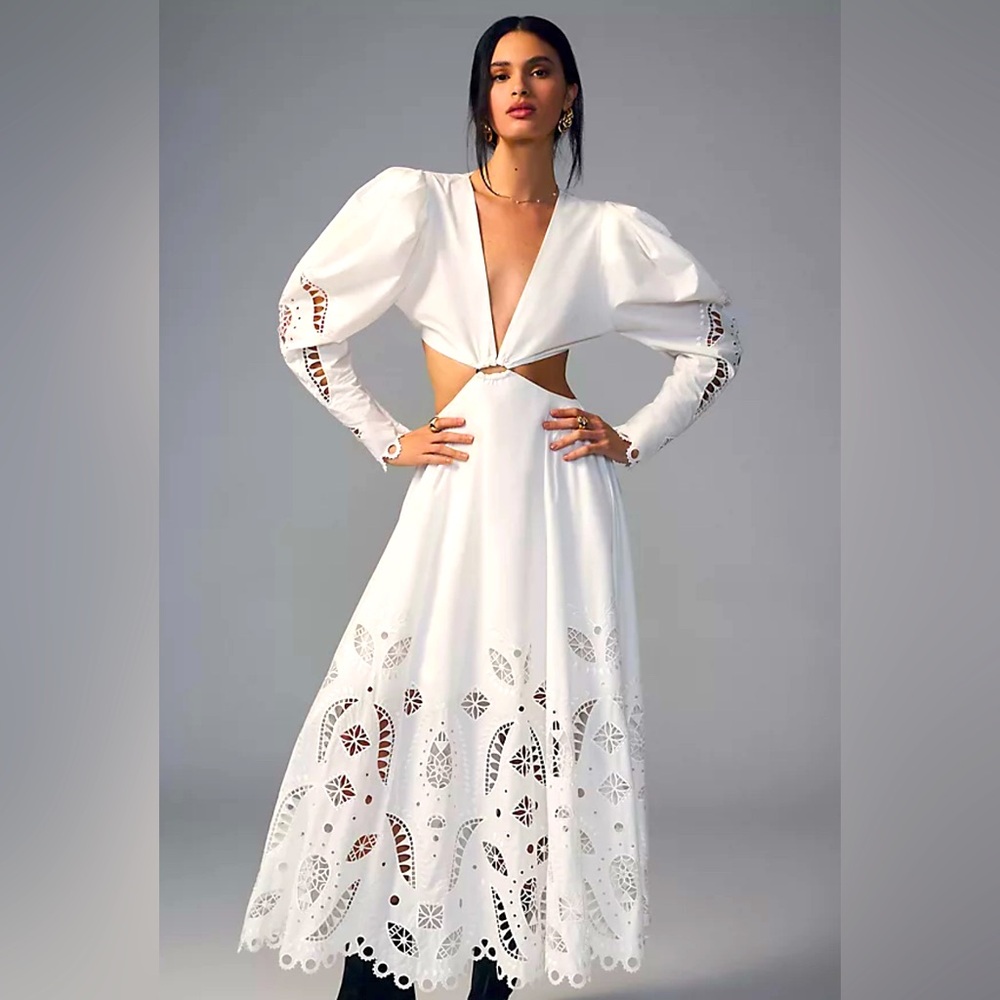 Elegant White Cutout Maxi Dress by Magali pascal